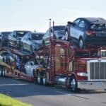 Open or Enclosed Auto Transport? Experts Weigh In